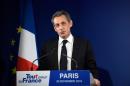 Former French president Nicolas Sarkozy delivers a speech to concede defeat in the first round of the rightwing presidential primary, at his campaign headquarters on November 20, 2016 in Paris
