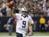 Saints quarterback Brees celebrates after scoring a touchdown pass to break Johnny Unitas' record of consecutive games with a touchdown pass, during the first half of their NFL football game against the Chargers in New Orleans