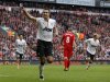 Manchester United's Van Persie celebrates scoring a penalty against Liverpool during their English Premier League soccer match in Liverpool