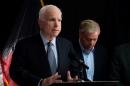 U.S. Senator John McCain speaks to reporters in Kabul, Afghanistan