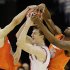 Indiana forward Cody Zeller (40) is trapped between Syracuse guard Brandon Trich, left, and forward Rakeem Christmas (25) during the first half of an East Regional semifinal in the NCAA college basketball tournament, Thursday, March 28, 2013, in Washington. (AP Photo/Alex Brandon)