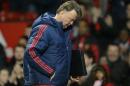 Manchester United's manager Louis van Gaal leaves after the match between Manchester United and Swansea City at Old Trafford on January 2, 2016