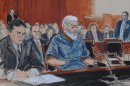 In this courtroom drawing, defense attorney, Jeremy Schneider, left, represents accused terrorist Abu Hamza al-Masri, center, in Manhattan federal court, Tuesday, Oct. 9, 2012, in New York. (AP Photo/ Elizabeth Williams)