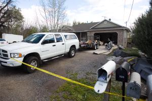 Authorities investigate a crime scene at a house in&nbsp;&hellip;