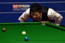 China's Ding Junhui takes part in his quarter-final match in the World Snooker Championships at The Crucible in Sheffield, England on April 28, 2015