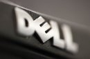 In this Aug. 15, 2011 photo, the logo on a Dell computer is displayed, in Philadelphia. Dell announced Monday, July 3, 2012, that it is buying Quest Software for about $2.36 billion, ending recent speculation about who the unnamed bidder was in a battle for the company with investment firm Insight Venture Partners. (AP Photo/Matt Rourke)