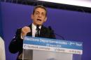 Former French President and conservative party UMP leader Nicolas Sarkozy gives a speech following the final round of French local elections, in Paris, France, Sunday, March 29, 2015. French voters are choosing members of local councils in run off elections Sunday seen as a test for the far right National Front, which is expanding its presence in French politics. The mainstream conservative UMP party came out ahead in the first round, ahead of the National Front and the governing Socialists. (AP Photo/Thibault Camus)