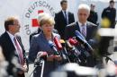 German Chancellor Merkel arrives for statement after visit to asylum seekers accomodation facility in Heidenau