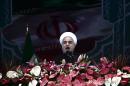 Iranian President Hassan Rouhani delivers a speech in Tehran's Azadi Square (Freedom Square) to mark the 36th anniversary of the Islamic revolution on February 11, 2015