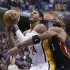 Indiana Pacers' Paul George (24) is fouled by Miami Heat's Dwyane Wade (3) as he goes for up for a shot during the second half of an NBA basketball game Tuesday, Jan. 8, 2013, in Indianapolis. The Pacers defeated the Heat 87-77. (AP Photo/Darron Cummings)