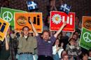Pro Independence 'Yes' supporters cheer during a speech by Bloc Quebecois Leader Lucien Bouchard in Montreal on October 24, 1995