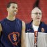Syracuse's Michael Carter-Williams walks on the court with Syracuse head coach Jim Boeheim during practice the NCAA Final Four tournament college basketball semifinal game against Michigan, Friday, April 5, 2013, in Atlanta. Syracuse plays Michigan in a semifinal game on Saturday. (AP Photo/David J. Phillip)