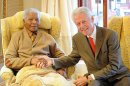 Former US President, Bill Clinton, right, meets with former South African President Nelson Mandela at his home in Qunu, South Africa, Tuesday, July 17, 2012 on the eve of Mandela's 94th birthday. (AP Photo/Peter Morey) CREDIT MANDATORY. SOUTH AFRICA OUT. NO SALES NO ARCHIVE NO USE AFTER 48 HOURS AFTER TRANSMISSION