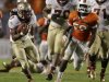 Florida State running back Devonta Freeman (8) runs for a first down past Miami linebacker Jimmy Gaines (59) during the second half of an NCAA college football game, Saturday, Oct. 20, 2012, in Miami. (AP Photo/Lynne Sladky)