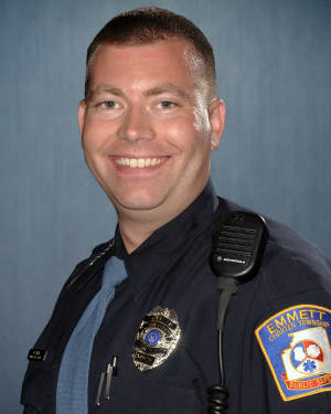 In this photo provided by Emmett Township, Mich., Department of Public Safety is Officer Ben Hall. Hall said was on patrol Friday, Oct. 3, 2014 when he stopped a vehicle Alexis DeLorenzo was driving following a report of an unsecured young child inside. Instead of ticketing DeLorenzo, who told him that she had fallen on tough times, Hall asked her to meet him at a local store where he bought a booster seat for her 5-year-old daughter. (AP Photo/Emmett Township Department of Public Safety)
