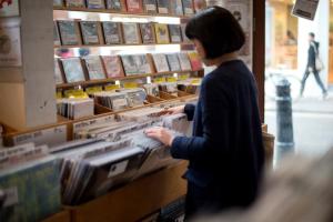 A customer browses through the records for sale at …