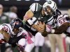 New York Jets quarterback Tim Tebow (15) is tackled by Houston Texans strong safety Glover Quin (29) and inside linebacker Bradie James (53) during the first half of an NFL football game, Monday, Oct. 8, 2012, in East Rutherford, N.J. (AP Photo/Kathy Willens)