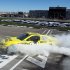 Driver Matt Kenseth burns out after winning the NASCAR Sprint Cup Series auto race on Sunday, March 10, 2013, in Las Vegas. (AP Photo/Isaac Brekken)