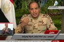 In this image made from video broadcast on Egypt's State Television, Egypt's military chief Abdel-Fattah el-Sissi speaks in a nationally televised speech, announcing that he will run for president, in Cairo, Egypt, Wednesday, March 26, 2014. In a nationally televised speech, el-Sissi said he has resigned from the military. Wearing military fatigues, he said it was the last time he would wear it and that "I give up the uniform to defend the nation" and run in elections expected next month. (AP Photo/Egyptian State Television)