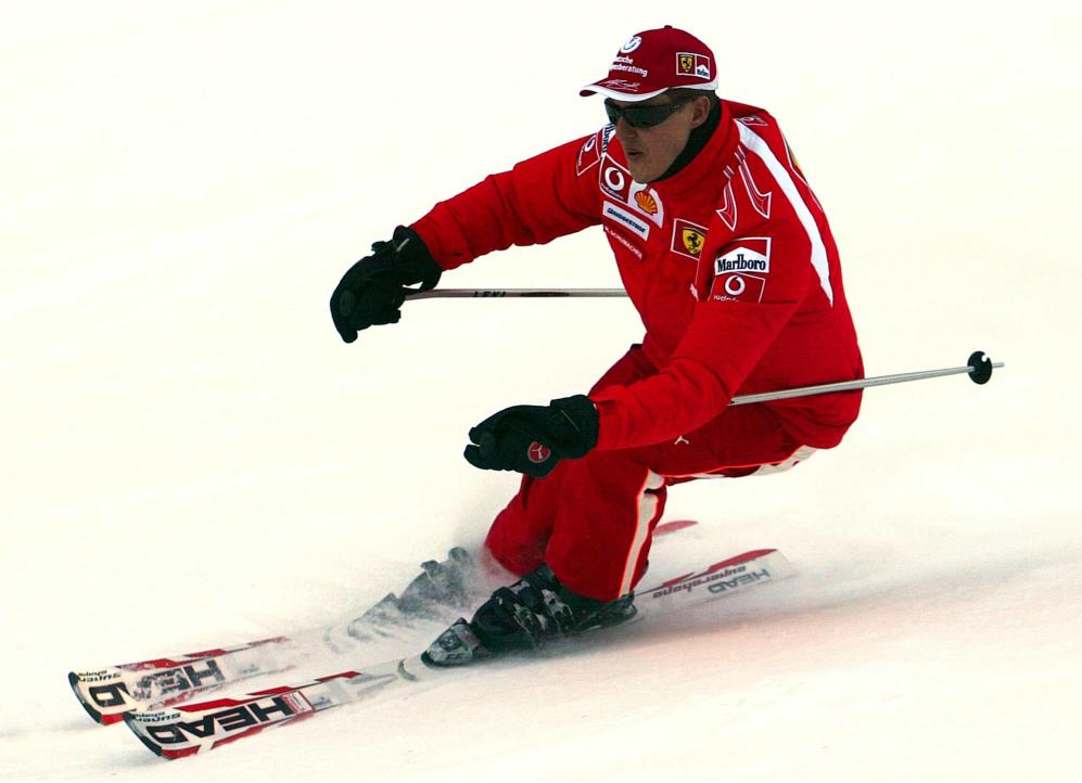 In this Thursday, Jan. 12, 2006 file photo provided by the Ferrari press office, Formula One driver Michael Schumacher of Germany speeds down a course in the Madonna di Campiglio ski resort, in the Italian Alps . French radio says retired Formula One champion Michael Schumacher has been injured in a skiing accident. RMC radio reported Sunday Dec. 29, 2013 that the seven-time champion had fallen while skiing off-piste at the French Alpine resort of Meribel. The radio quoted resort director Christophe Gernigon-Lecomte as saying that Schumacher was wearing a helmet when he fell and hit a rock. (AP Photo/Ferrari, File)