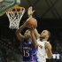 Kansas Elijah Johnson (15), left, drives on Baylor's Rico Gathers (2), right, in the first half of a NCAA basketball game, Saturday,  March 9,  2013, in Waco, Texas. (AP Photo/Waco Tribune Herald, Rod Aydelotte)