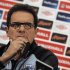 File photograph shows England's manager Fabio Capello listening during a news conference at Wembley stadium in London