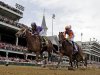 Mike Smith rides Princess of Sylmar to a win over Beholder ridden by Garrett Gomez in the 139th Kentucky Oaks at Churchill Downs Friday, May 3, 2013, in Louisville, Ky. (AP Photo/David J. Phillip)
