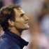 Federer of Switzerland looks up at the crowd following his evening win over Phau of Germany during the US Open men's singles tennis tournament in New York