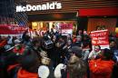 Fast food workers attend a protest against McDonald's outside one of its restaurants in New York