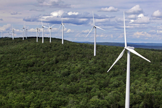Wind turbines line a ridge on Stetson Mountain in Stetson, Maine. (AP Photo/Robert F. Bukaty)