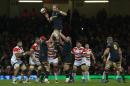 Wales' lock Alun Wyn Jones (C) catches a lineout ball during their rugby union test match against Japan at the Principality stadium in Cardiff, south Wales, on November 19, 2016