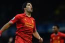 Liverpool's Uruguayan striker Luis Suarez reacts at Goodison park in Liverpool on November 23, 2013