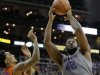 Kansas State forward Thomas Gipson (42) beats Florida guard Mike Rosario, left, to a rebound during the first half of an NCAA college basketball game on Saturday, Dec. 22, 2012, at the Sprint Center in Kansas City, Mo. (AP Photo/Charlie Riedel)