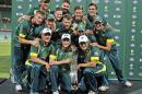 Australia's cricket team poses for a photo after winning their one-day international cricket series against South Africa in Sydney, Australia, Sunday, Nov. 23, 2014. Australia won the series 4-1.(AP Photo/Rob Griffith)