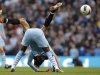 Manchester City's Balotelli challenges Wolverhampton Wanderers' Johnson during their English Premier League soccer match in Manchester