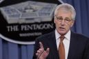 FILE - In this Feb. 7, 2014 file photo, Defense Secretary Chuck Hagel speaks during a briefing at the Pentagon. A U.S. official says that as part of the proposed 2015 defense budget, Pentagon chief Chuck Hagel is recommending shrinking the Army to its smallest size in decades. (AP Photo/Susan Walsh)