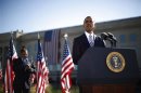 U.S. President Obama speaks near U.S. Secretary of Defense Panetta on the 11th anniversary of the September 11 attacks at the Pentagon near Washington