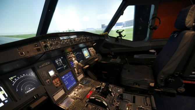 A picture taken inside a cockpit of an Airbus A320 flight simulator shows the seat of the co-pilot in Vienna