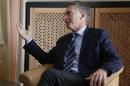 Argentina's President Macri speaks with British Prime Minister Cameron as they meet in hotel Belvedere during the annual meeting of the World Economic Forum (WEF) in Davos