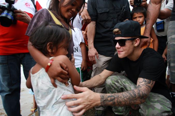 BESTPIX: Justin Bieber Visits Areas Of Philippines Left Devastated By Typhoon Haiyan