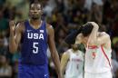 United States' Kevin Durant, left, reacts in front of Spain's Rudy Fernandez, right, during a semifinal round basketball game at the 2016 Summer Olympics in Rio de Janeiro, Brazil, Friday, Aug. 19, 2016. (AP Photo/Charlie Neibergall)