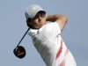 Rory McIlroy, of Northern Ireland, watches his tee shot on the 10th hole during the first round of the Honda Classic golf tournament, Thursday, Feb. 28, 2013, in Palm Beach Gardens, Fla. (AP Photo/Wilfredo Lee)