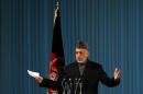 Afghanistan's incumbent President Hamid Karzai speaks during a cultural event in Kabul