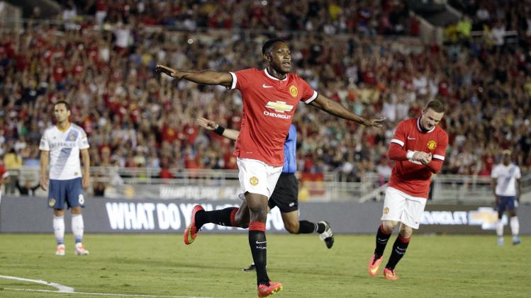 Manchester United&#39;s Danny Welbeck celebrates after scoring against the Los Angeles Galaxy during the first half of a friendly soccer match at Rose Bowl on Wednesday, July 23, 2014, in Pasadena, Calif. (AP Photo)