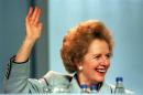 British Prime Minister Margaret Thatcher votes on October 10, 1989 to adopt the agenda during the opening of the Conservative Party Conference in Blackpool
