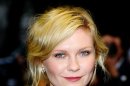 Kirsten Dunst said kissing Brad Pitt wasn't much fun for a 12-year-old girl