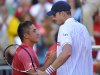 Spain's Nicolas Almagro, left, is congratulated by John Isner of US after winning the second single match at Davis Cup World Group Semi-final tennis match in Gijon, northern Spain, Friday, Sept. 14 , 2012. Almagro won the match 6-4, 4-6, 6-4, 3-6, 7-5. (AP Photo/Alvaro Barrientos)