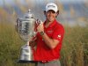 McIlroy lifts the Wanamaker Trophy after capturing the PGA Championship at The Ocean Course on Kiawah Island
