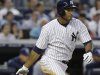 New York Yankees' Zoilo Almonte hits a single during the fourth inning of a baseball game against the Tampa Bay Rays, Friday, June 21, 2013, in New York. (AP Photo/Frank Franklin II)