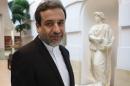 Iran's top nuclear negotiator Araqchi leaves a hotel after meeting senior officials from the United States, Russia, China, Britain, Germany and France in Vienna